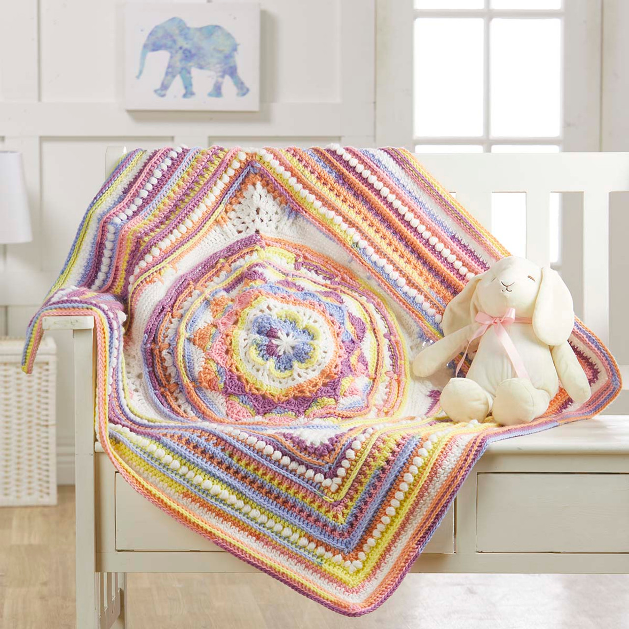 a multicolored baby blanket