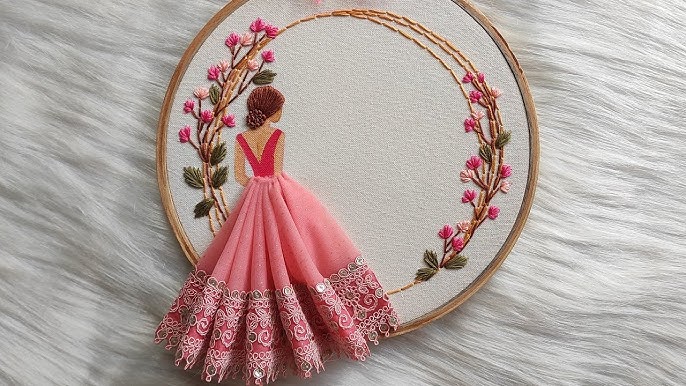 a stitched girl with fabric dress on a loop